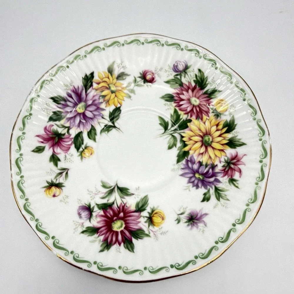 Vintage Queen's Rosina Wild Flowers fine bone china Tea cup with matching saucer